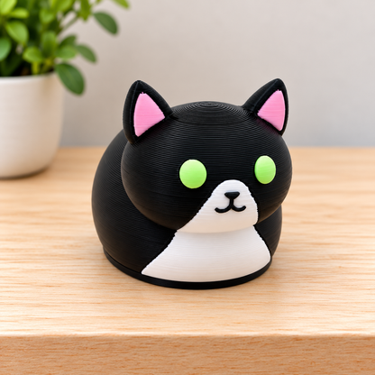 Black and white cat Shoulder Loaf with green eyes