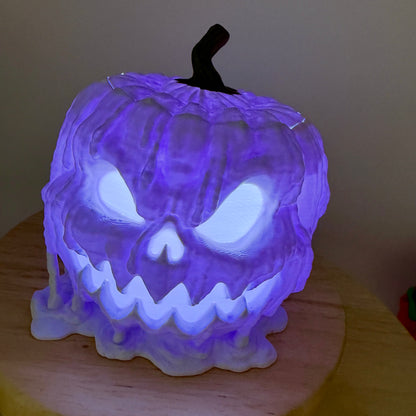 Melting jack-o'-lantern glowing purple