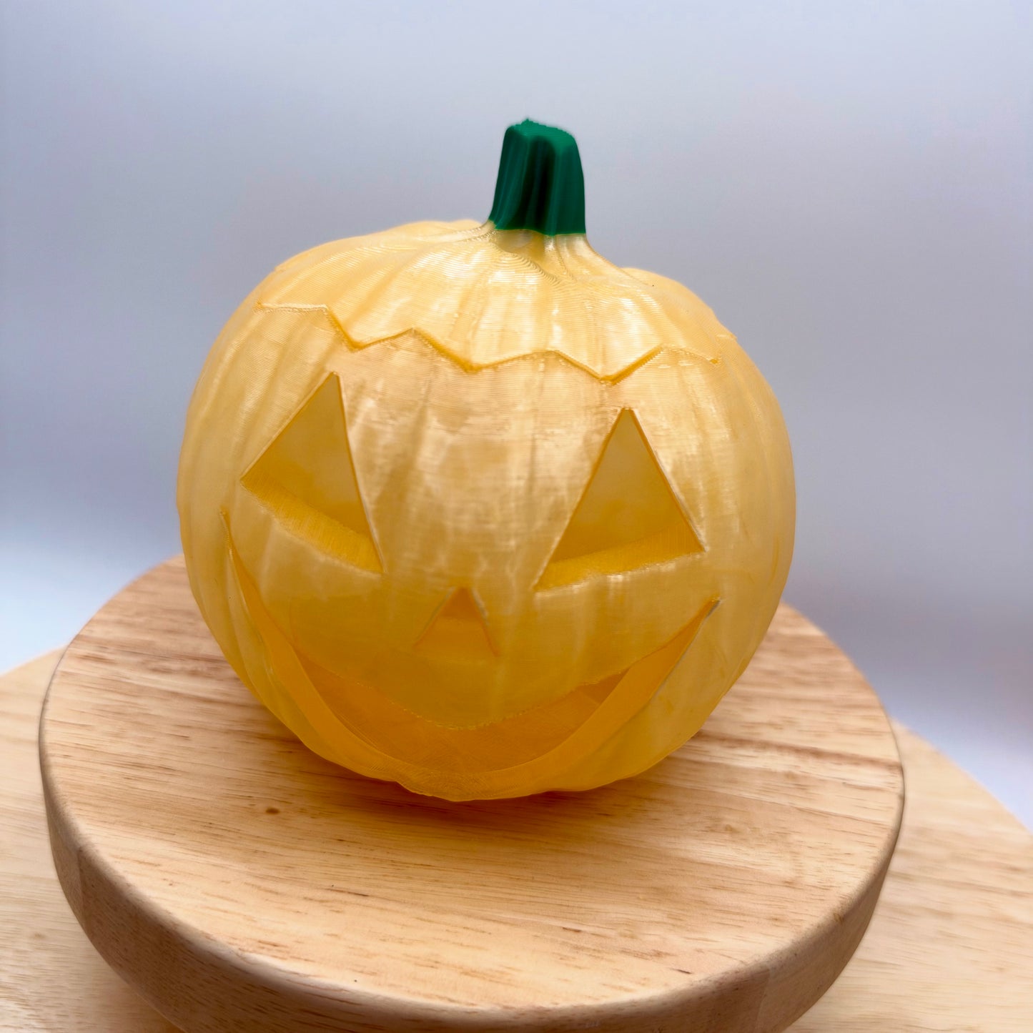 Pale gold jack-o'-lantern decoration